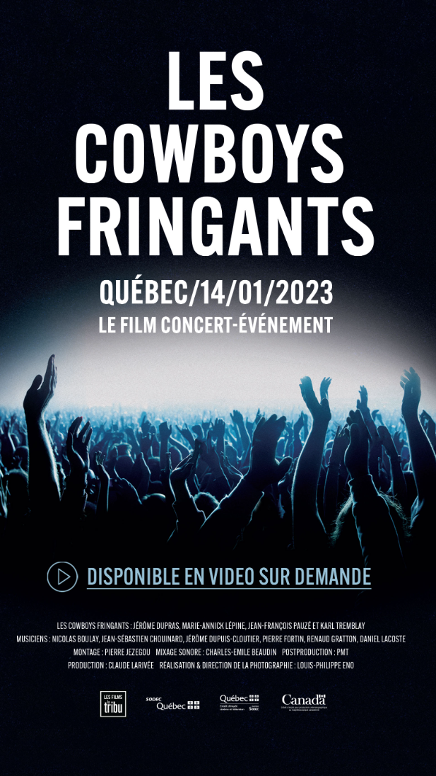 Concert des Cowboys Fringants sur scène au Centre Vidéotron, devant une foule rassemblée, lors de la tournée Les Antipodes en 2023.