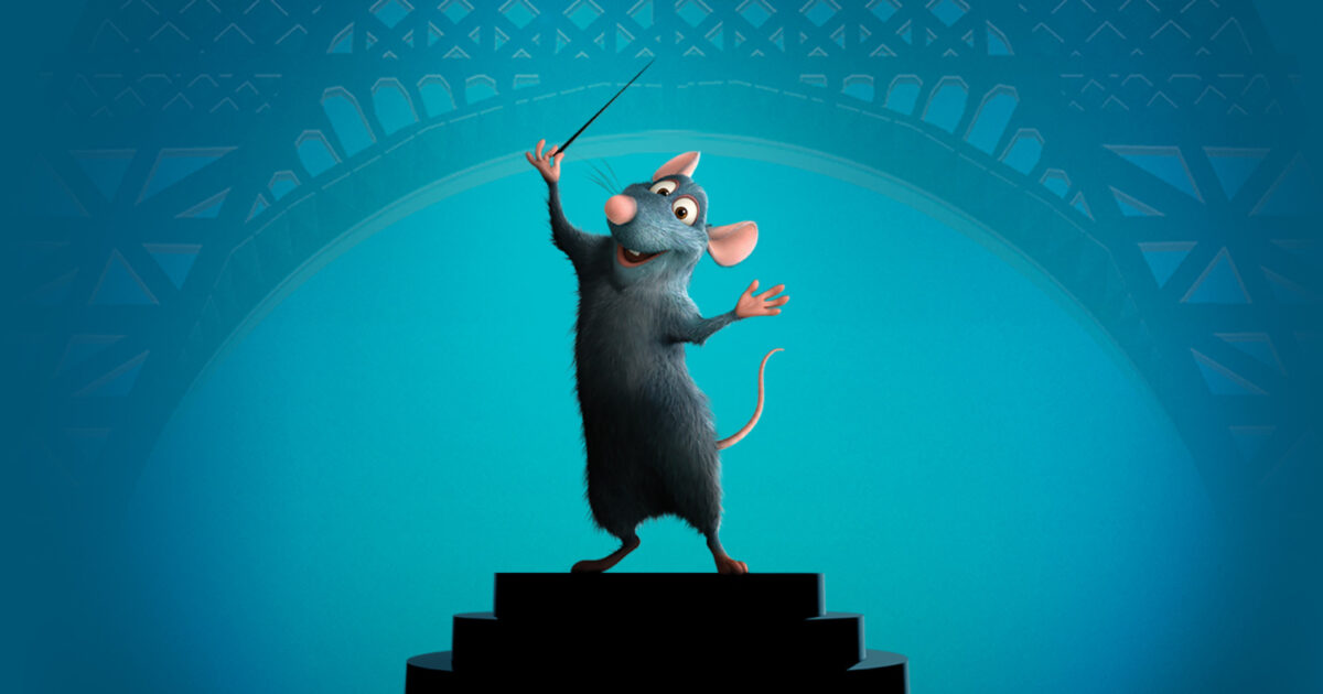 Affiche du spectacle Ratatouille en concert montrant le rat Rémy avec une cuillère en bois sur fond de Paris.