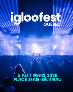 Foule habillée chaudement qui danse devant la scène illuminée de l'Igloofest Québec en plein hiver