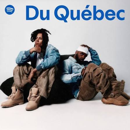 Promotional image with two men in denim jackets sitting on a white backdrop, 'Du Québec' in bold blue text above and a Spotify logo.
