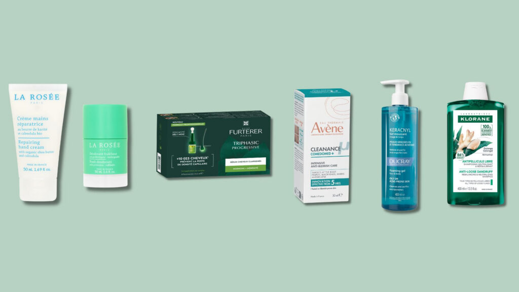 Line of six skincare products on a pale green background, from left: La Rosée hand cream, La Rosée deodorant, Furterer shampoo, Avène Cleanance, Ducray Keracnyl foaming gel, Klorane anti-dandruff shampoo.