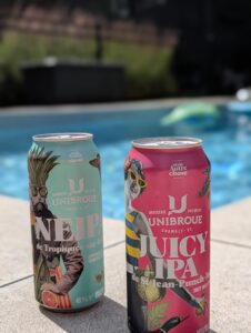 Canettes colorées et verres de bière Juicy IPA et NEIPA de la Série Autre Chose d'Unibroue