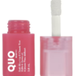 Pink liquid lipstick in a pink tube with white applicator wand beside it; QUO branding visible on packaging.