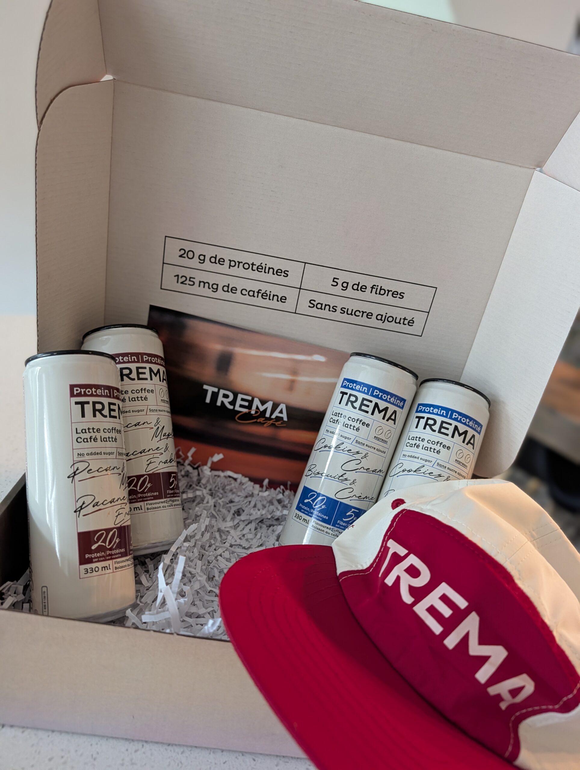 canettes de café latté protéiné TREMA aux saveurs pacane et érable et biscuits et crème